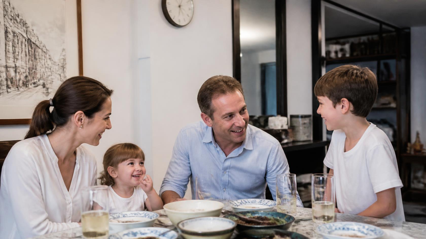 Illustrative parents and children sharing a meal